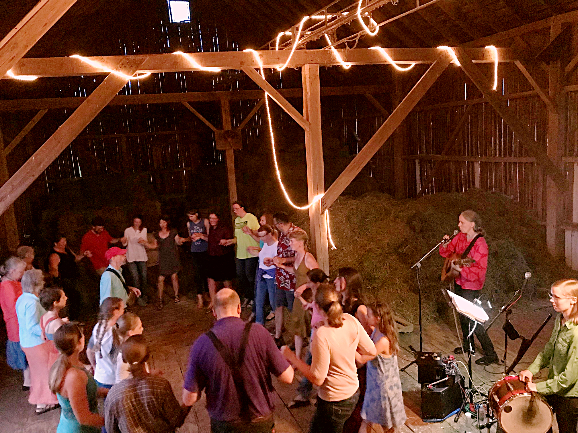 Photo of the Hi-Dukes performing as a trio in a barn 